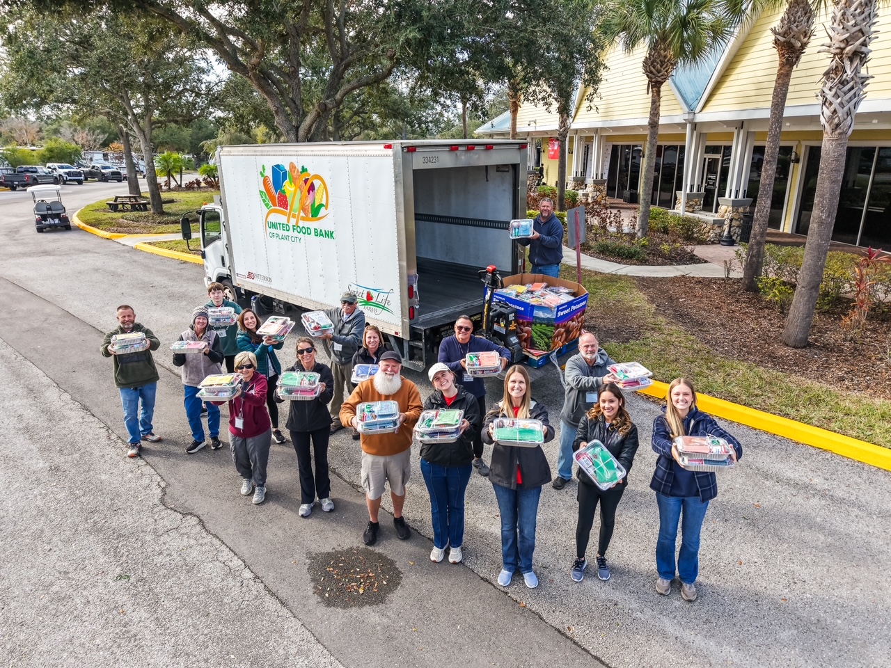 Attendees packing meals with the United Food Bank of Plant City